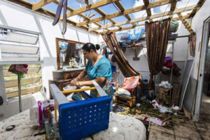 Marry Ann Aldea loss everything at her house after the winds of hurricane Maria ripped away her roof. The mountain town of Juncos is one of the most affected after the pass of Hurricane María on Sept. 24. (From  Reuters) 