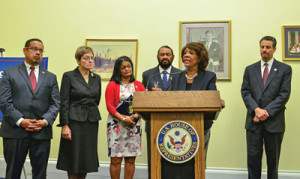 Rep. Maxine Waters (D-Calif.) speak from the podium about The Megabank Accountability and Consequences Act. Waters is flanked by (from left-right) Reps. Keith Ellison (D-Minn.); Marcy Kaptur (D-Ohio), Pramila Jayapal (D-Wash.); Al Green (D-Texas), and John Sarbanes (D-Md.).                     (Freddie Allen/AMG/NNPA)