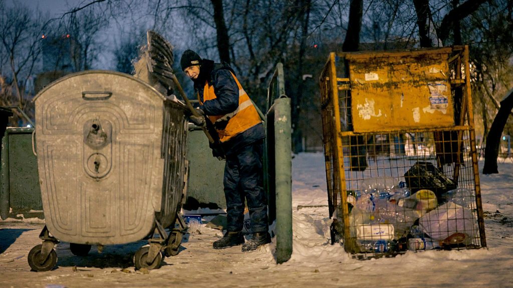 Russian Street Sweeper Gets a Mock Magazine Cover that Helps him to pay off his Debt