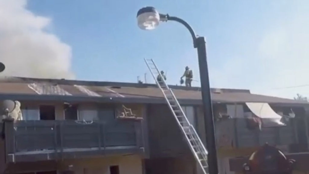 VIDEO: Roofless: Firefighters Tear The Top Off An Apartment Block To Halt Blaze