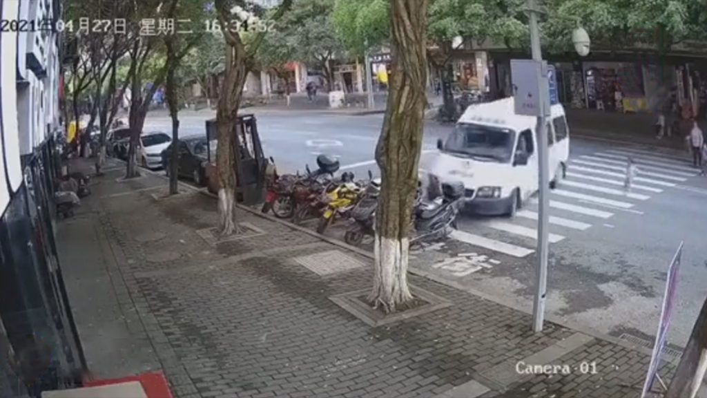 VIDEO: Tot An Amazing Escape: Van Skids To Stop One Inch From Kid On Crossing