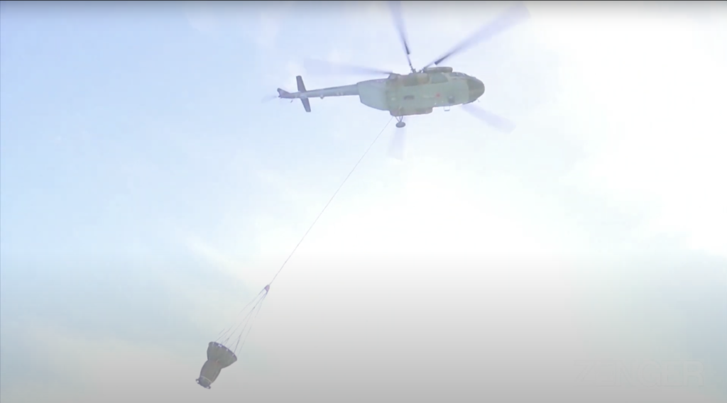 VIDEO: Military Helicopter Drops Massive Amount Of Water Onto Russian Fire
