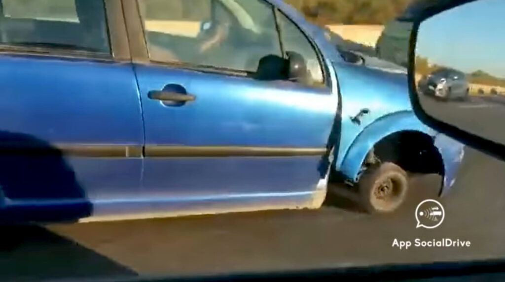 VIDEO: A Wheel Mystery: Middle-Lane Road Hog Motors Along Busy Highway With Missing Tire