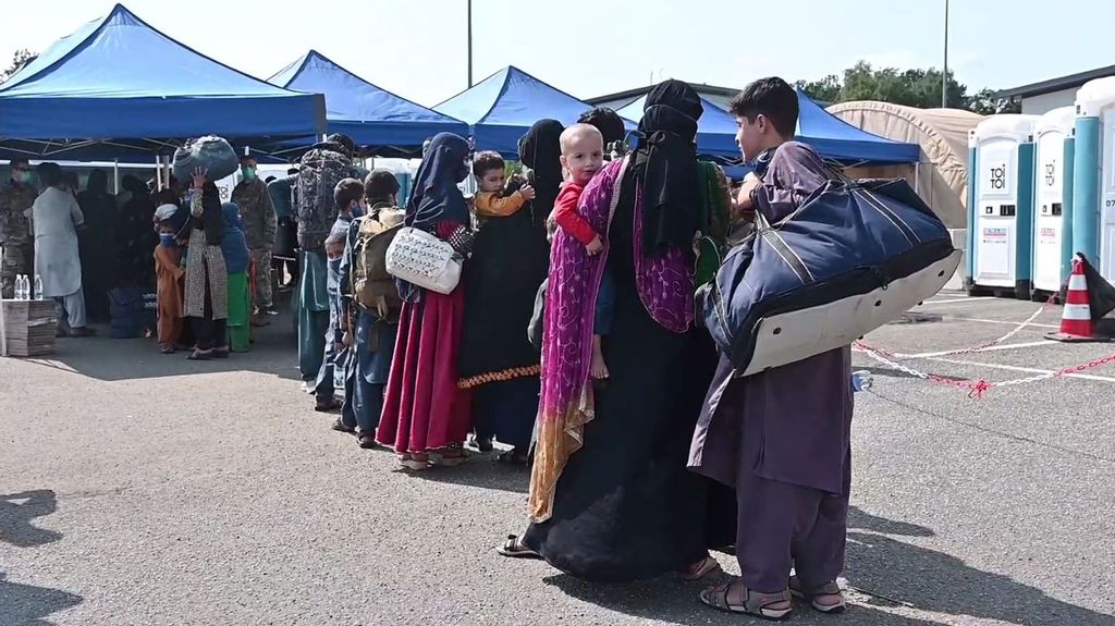 VIDEO: U.S. Troops Roll Out Welcome Mat For Afghan Evacuees At German Air Base