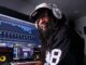 Shaleef Perkins, who writes and performs raps about the NFL's Las Vegas Raiders and its players, in the recording studio. (Nicholas Perkins)