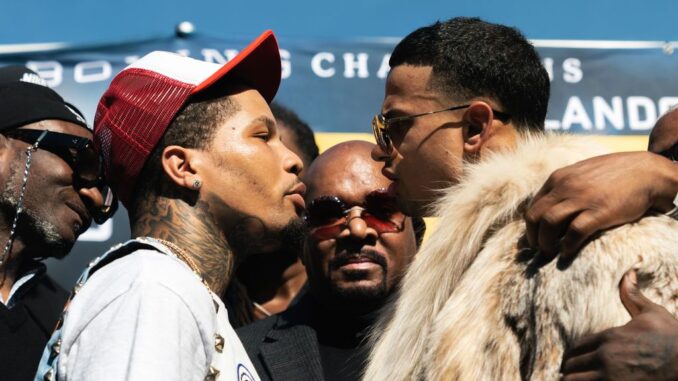 WBA lightweight champion Gervonta Davis (left) and challenger Rolando Romero (right) overcame street violence as children in their respective neighborhoods. The winner of their Dec. 5 clash “comes down to whose power can get there first,” said Mayweather Promotions CEO Leonard Ellerbe (center). (Premier Boxing Champions)