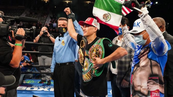 Switch-hitting WBC champion Brandon Figueroa (center) is predicting a knockout in Saturday's 122-pound unification clash of unbeatens against WBO counterpart Stephen “Cool Boy” Fulton, who is seeking his ninth victory over an undefeated opponent. (Sean Michael Ham/TGB Promotions)