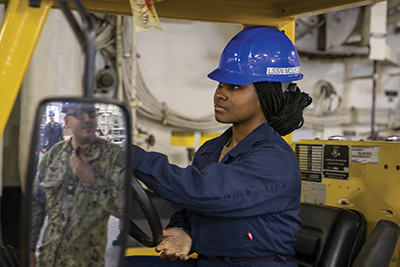 Broward County native practices forklift operating procedures aboard USS Tripoli