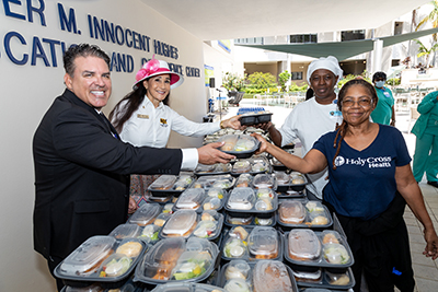 Rita Case Tips Her Hat to Holy Cross Health Nurses and Hospital Staff